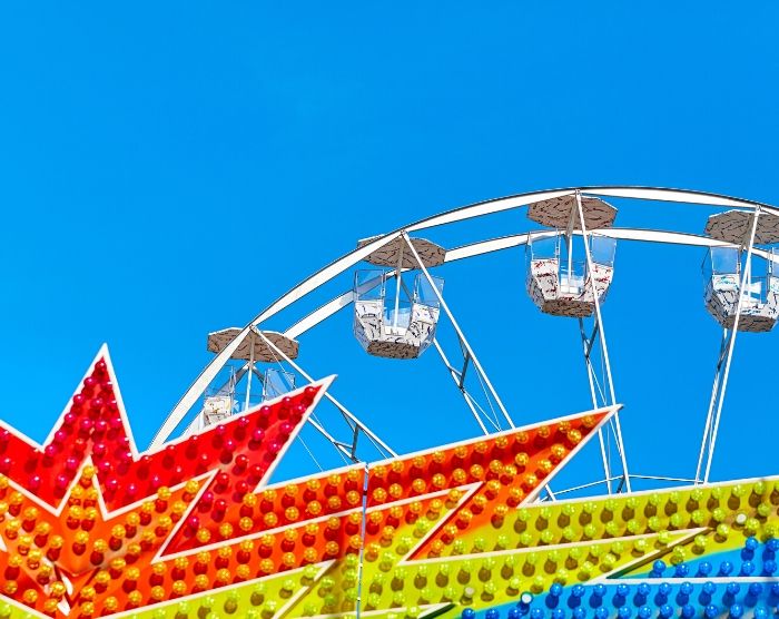 Solo Travel Tips for Theme Parks with White Ferris Wheel