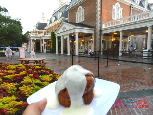 Taste of Epcot Food and Wine American Carrot Cake with running icing on the side. Keep reading to learn about the best food at Epcot Food and Wine Festival!