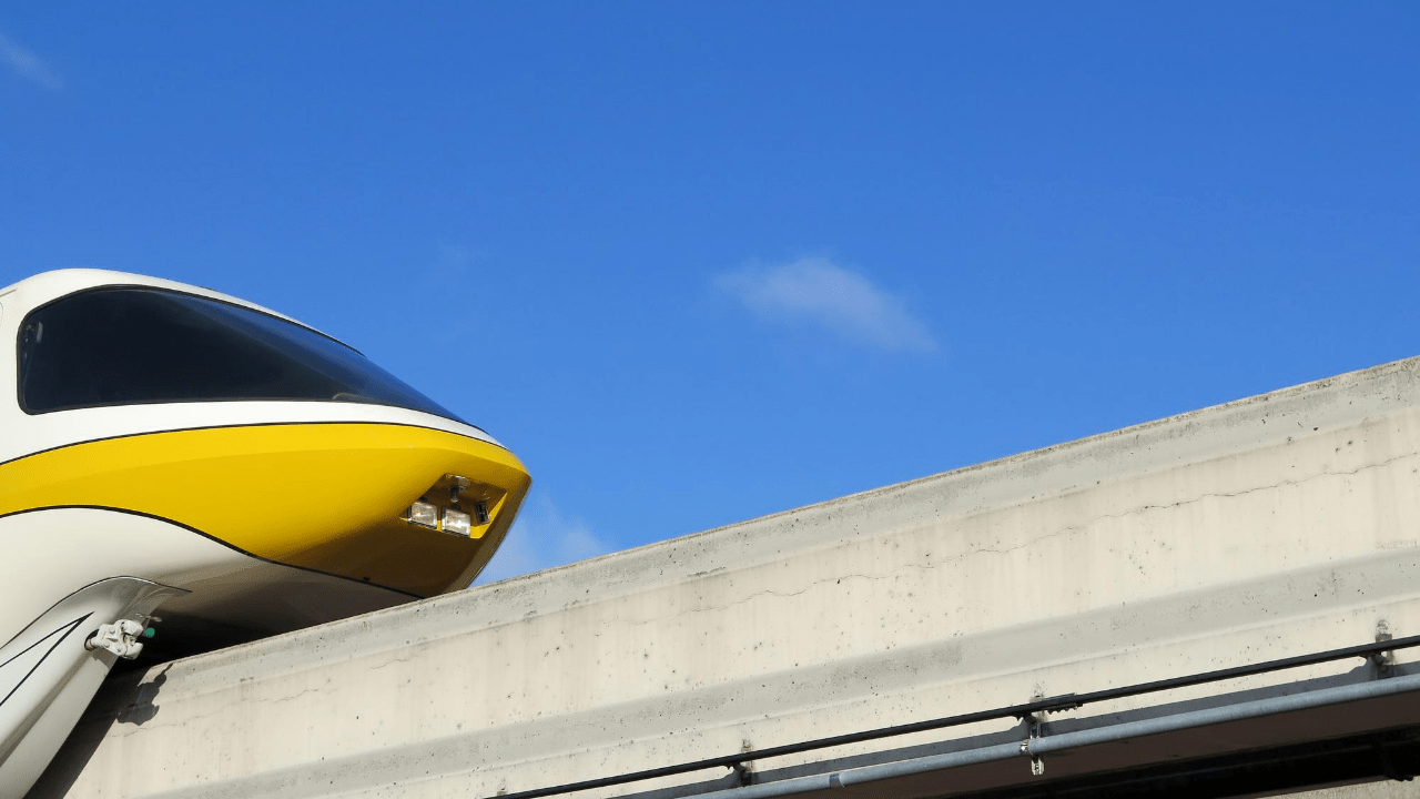 disney monorail transportation ticket center yellow vehicle