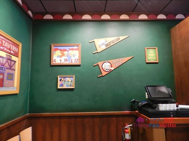 Moes Tavern Bar Area with Springfield Sports Memorabilia. Keep reading to get the best photos at Moe's Tavern Universal Studios and the menu.