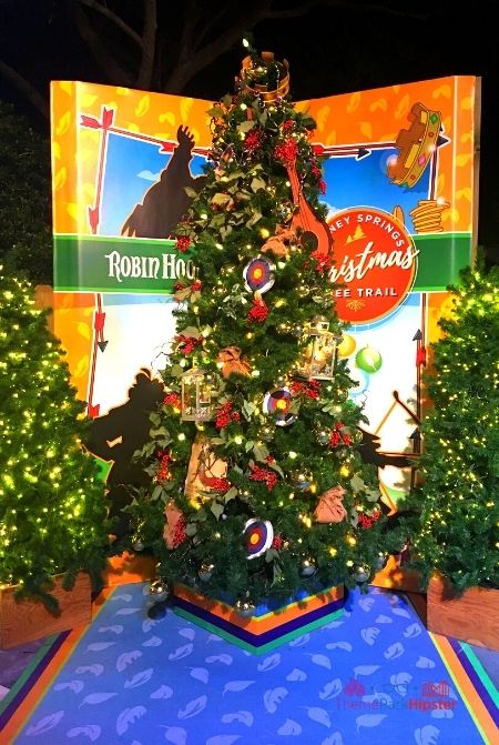 Disney Springs Christmas Tree Trail Robin Hood. Keep reading to learn about the best Disney Resorts at Christmas!