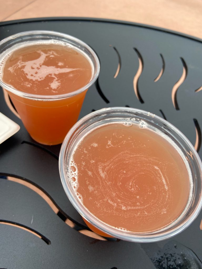 Glitter Beer at Epcot Festival of the Arts. Keep reading for the best food at Epcot Festival of the Arts.