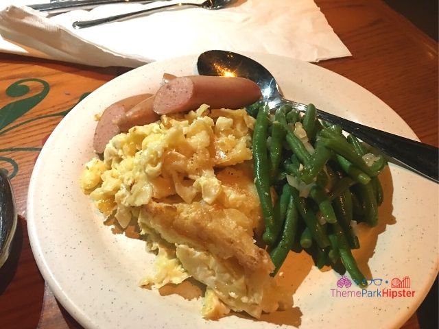 Germany Biergarten Restaurant Epcot mac and cheese with green beans and pork sausage