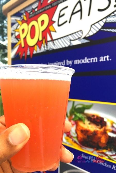 Epcot Festival of the Arts Pop Eats Glitter Beer. Keep reading to get the full Epcot Festival of the Arts guide, tips, food, concerts and more!