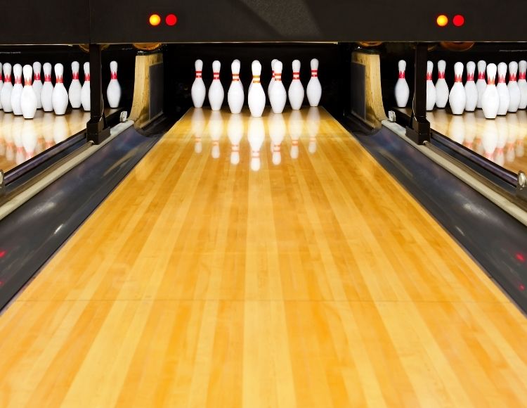 Bowling lane with all pins standing up. Keep reading to find out the 25 most romantic things to do at Disney World.