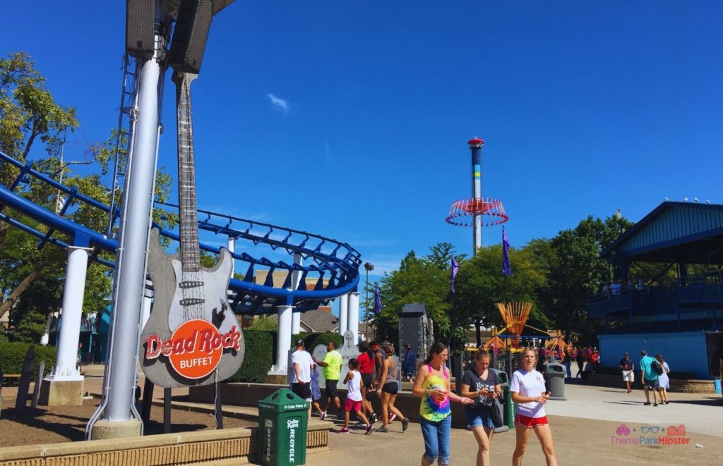 Cedar Point Boomerang Roller Coaster with Windseeker in the Background. Keep reading for more Cedar Point tips.