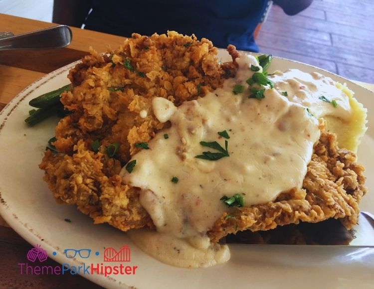 Homecomin Disney Springs Country Fried Steak. Keep reading to learn where to find the best breakfast in Disney Springs.
