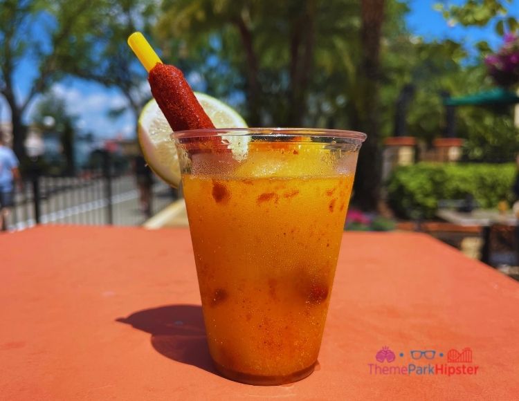 Mango frozen drink at Universal Studios. Keep reading to learn how to deal with traveling alone with anxiety on your solo Universal Orlando trip