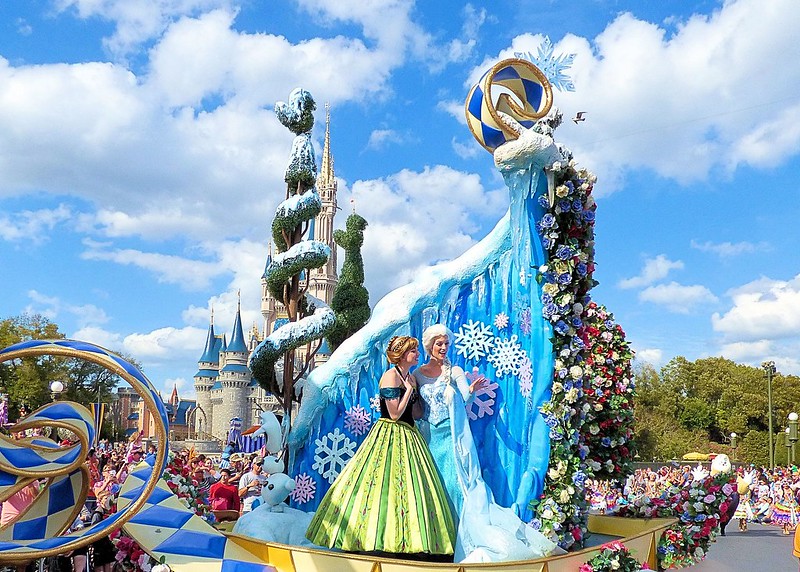 Disney Festival of Fantasy Parade with Ana and Elsa of Frozen. Keep reading to learn about the best Magic Kingdom shows and why you'll want to stick around to watch a Magic Kingdom night show.