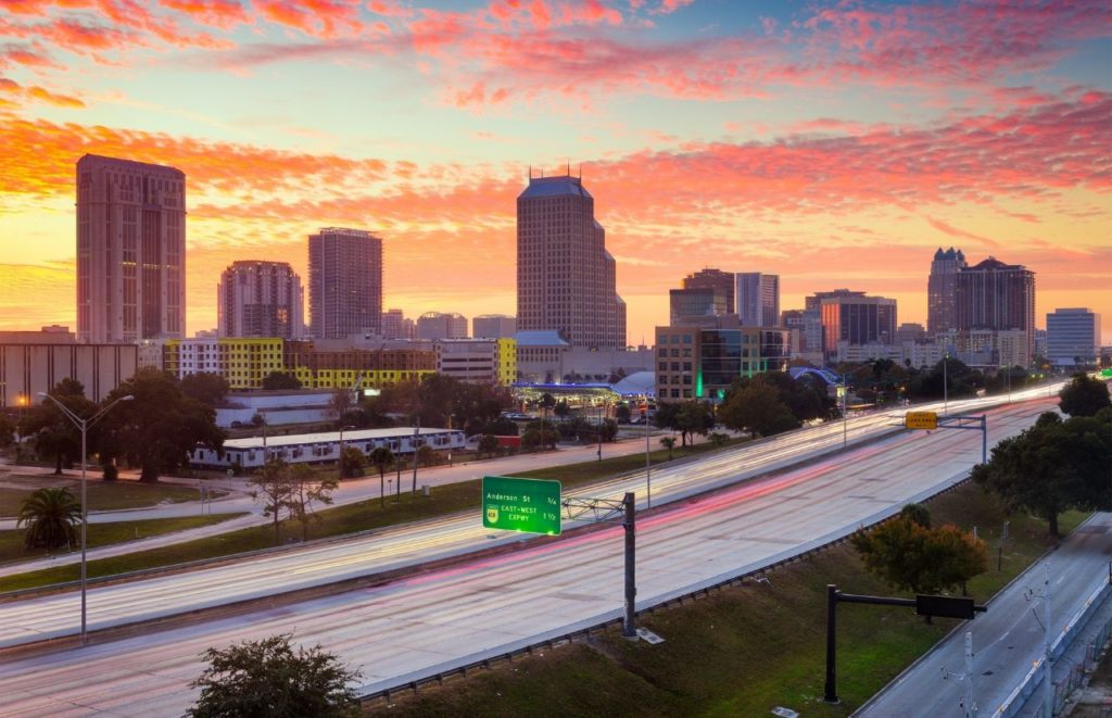 Downtown Orlando. Keep reading to learn how to fly to Orlando and how to find cheap flights to Orlando.