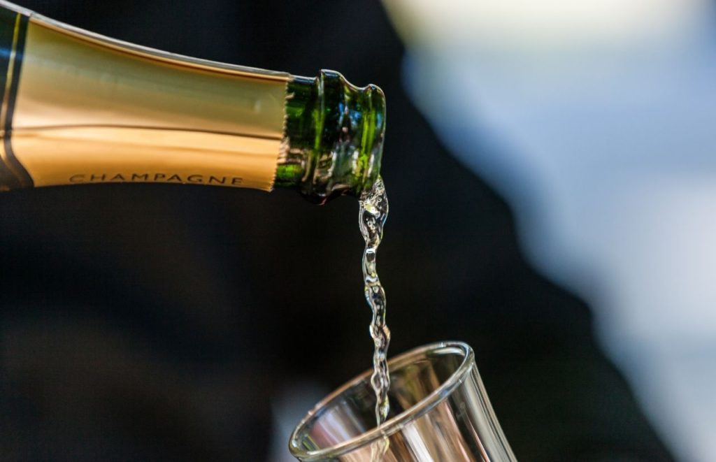 Pouring Champagne. Keep reading to learn more about the Epcot International Food and Wine Festival Menu.