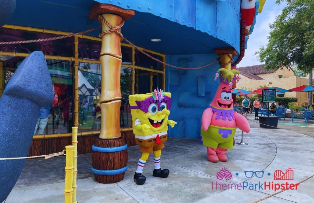 Famous characters Spongebob Squarepants and Patrick at Universal Studios Florida. Keep reading to learn all the best things to do on a Universal Studios solo trip. 