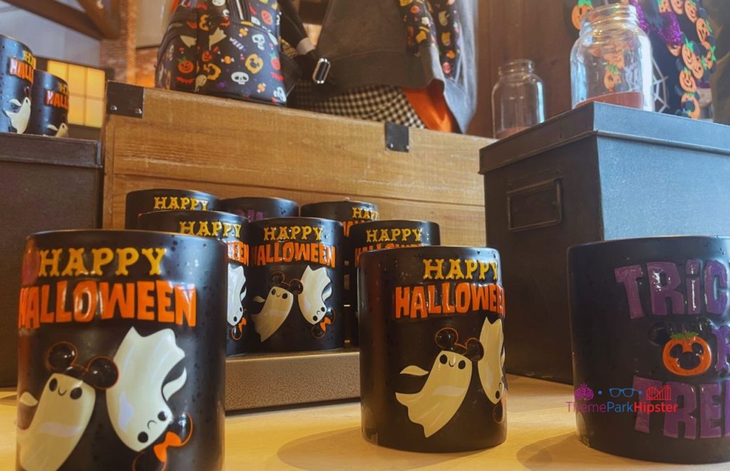 2021 Disney Halloween Merchandise Ghost Mugs with Trick or Treat on the Back. Keep reading to get the best Disney World souvenirs to buy for your trip!