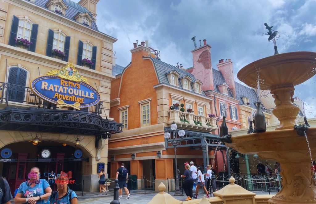 New Ratatouille Ride at Epcot front entrance with fountain. Keep reading to know what to wear to Disney World in February and what to pack for Disney World in February!