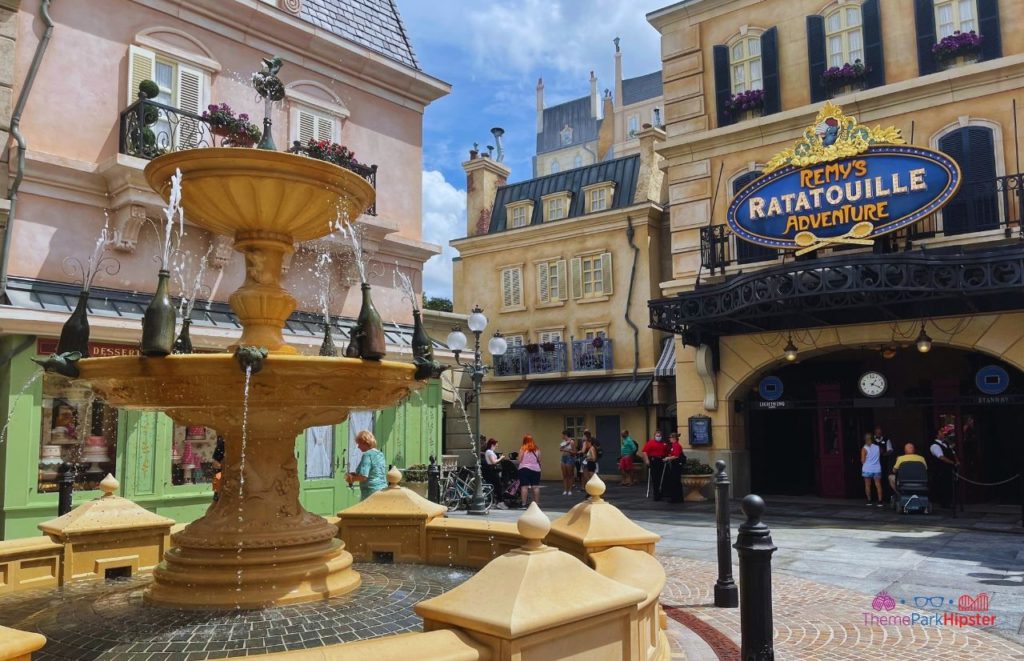 Entrance to Remys Ratatouille Adventure with mouse waterfall. Keep reading to get the world rides at Epcot for solo travelers on a solo disney world trip.