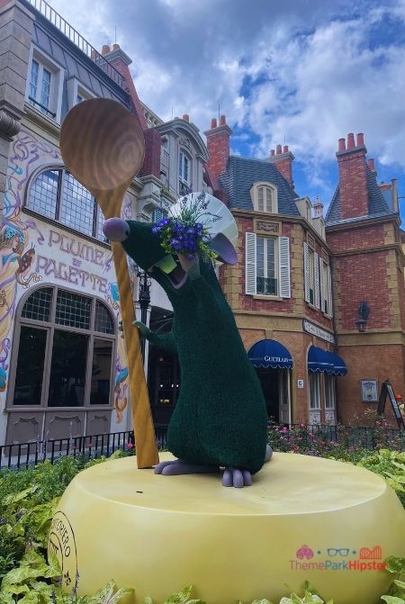 Plume Et Pagette France Pavilion with Remy Topiary Epcot. Keep reading to get the full Remy's Ratatouille Adventure Guide: Photos, Secrets, Food and more!