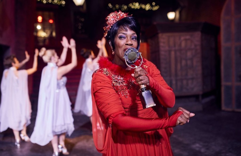Celestina Warbeck singing Christmas songs in Diagon Alley Wizarding World of Harry Potter