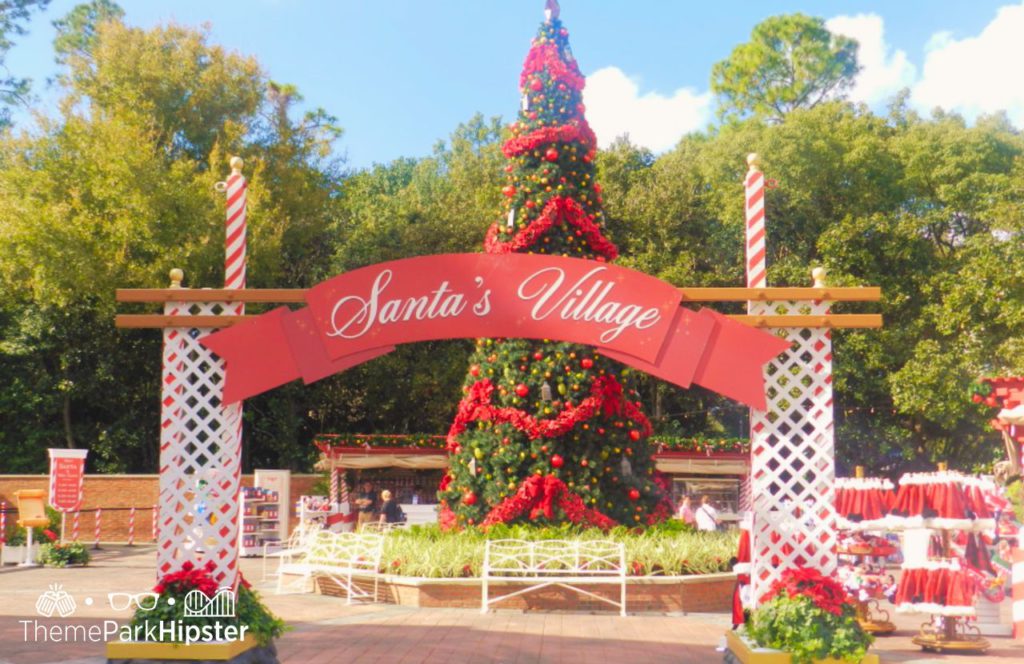 Christmas at Epcot with Christmas Tree in Santa's Village. Keep reading to get the Best Disney Christmas Sweaters!