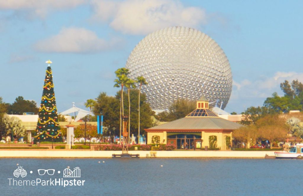 Christmas at Walt Disney World Epcot World Showcase with Tall Christmas Tree. Keep reading to learn about the best Disney Resorts at Christmas!