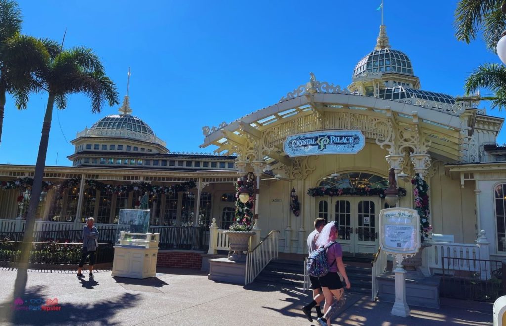 Crystal Palace Entrance Magic Kingdom in Disney Christmas Decor. Keep reading to know what are the best days to go to the Magic Kingdom and how to use the Disney World Crowd Calendar 2024.