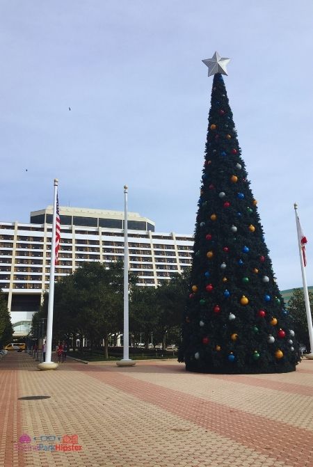 Disney Contemporary Resort large Christmas Tree Outside. Keep reading to learn about the best Disney Resorts at Christmas!