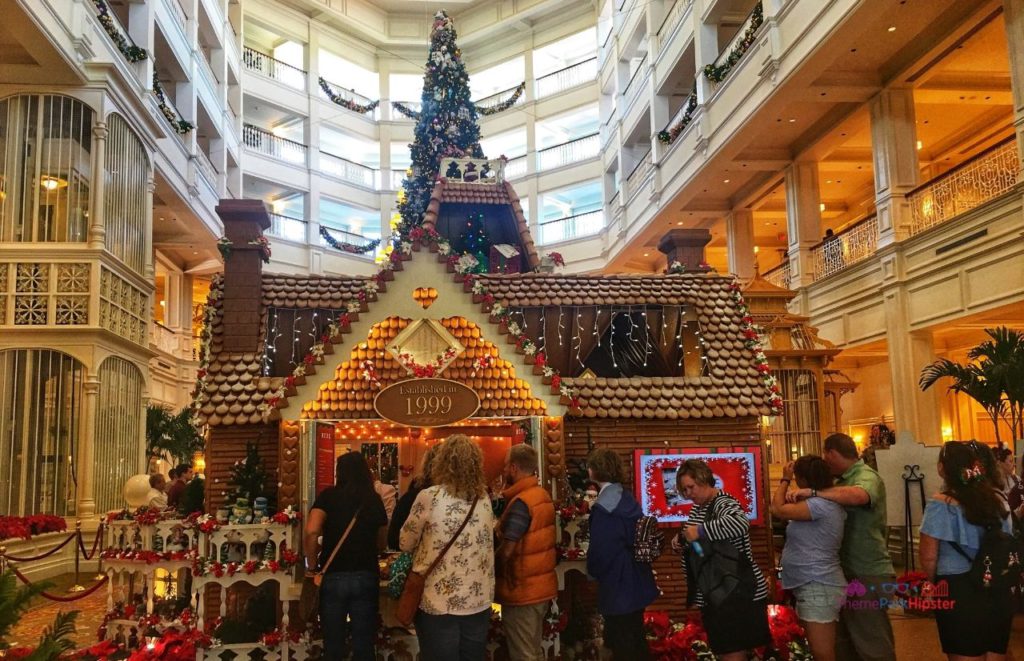 Disney Grand Floridian Resort and Spa Gingerbread House Entrance. Keep reading to learn about the Disney World Gingerbread house display on Theme Park Hipster!