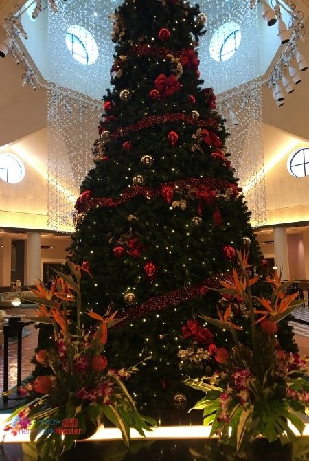 Swan and Dolphin Resort Christmas Tree in the Lobby. Keep reading to learn about the best Disney Christmas trees!