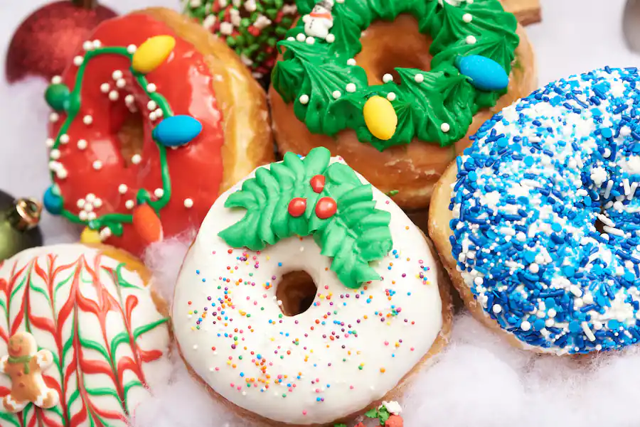 Everglazed Donuts and Cold Brew Christmas Donuts at Disney Springs. Keep reading to get the best Disney Christmas treats and desserts on this foodie guide.