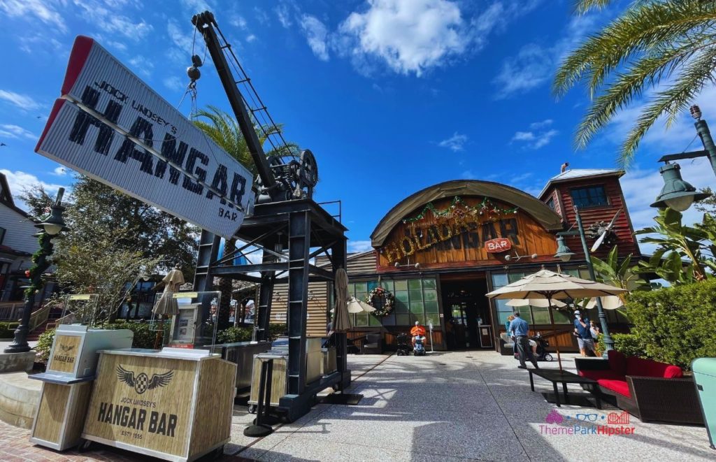 Jock Lindsey's Hangar Bar with holiday Christmas decor in Disney Springs with vintage and airplane decoration inspiration. Keep reading to discover the 25 most romantic things to do at Disney World for couples. 