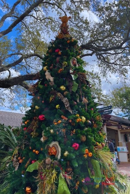 Lion King Christmas Tree at Disney Springs Walt Disney World. Keep reading to get the full guide on Christmas at Disney Springs!