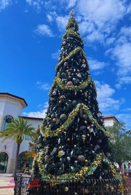 Main Disney Springs Christmas Tree. Keep reading to learn more about the Christmas Tree Trail at Disney World.