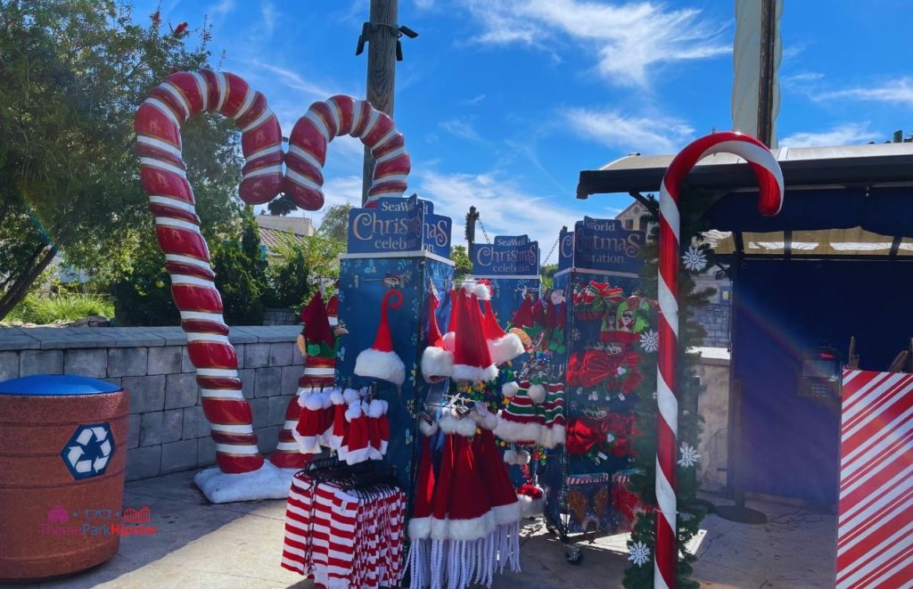 SeaWorld Christmas Celebration Holiday Merchandise with heart candy cane. Keep reading to get your SeaWorld Orlando Resort Travel Guide.