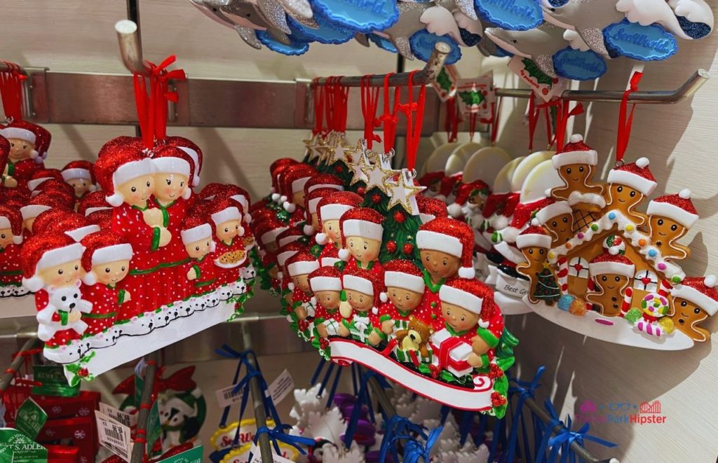 SeaWorld Christmas Celebration Holiday Ornaments with Families in red Christmas Pajamas