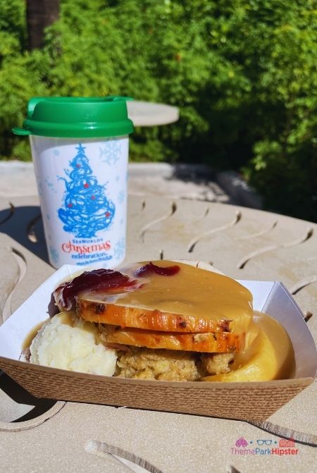 SeaWorld Christmas Celebration Traditional Holiday Meal with Turkey Gravy Mashed Potato Dressing and Cranberry Sauce
