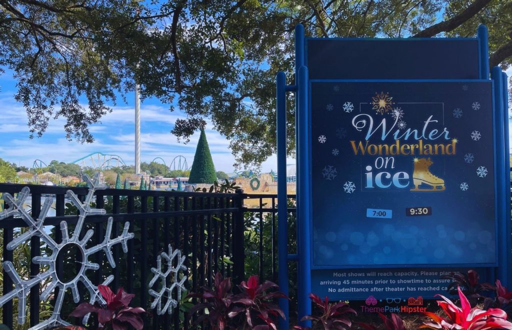 SeaWorld Christmas Celebration Winter on Ice with Sea of Trees in the Background. Keep reading to learn about Christmas at SeaWorld Orlando!