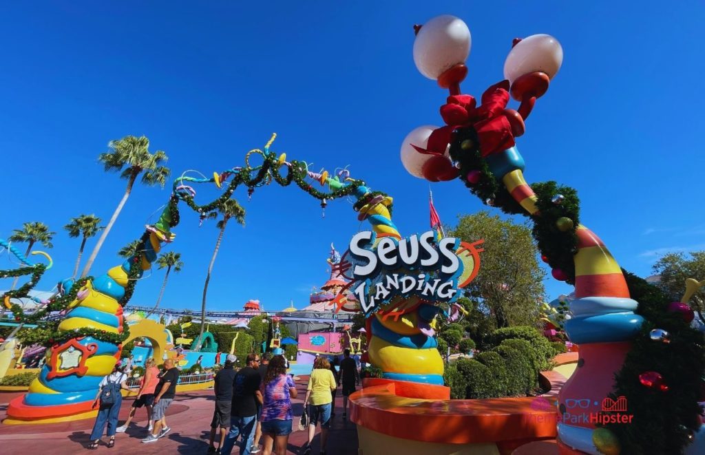 Seuss Landing Entrance at Christmastime. Keep reading to get the full guide to Christmas at Universal Orlando Resort!