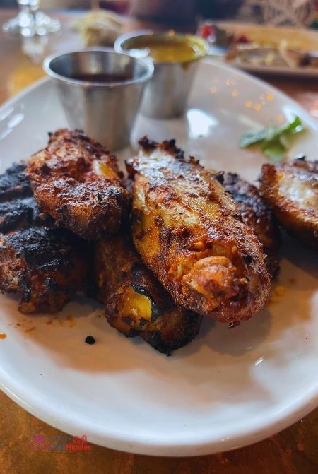 Smoked chicken wings at City Works in Disney Springs. Keep reading to learn how to do Thanksgiving Day at Disney World.