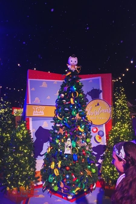 Snow in Disney Springs with Toy Story Christmas Tree