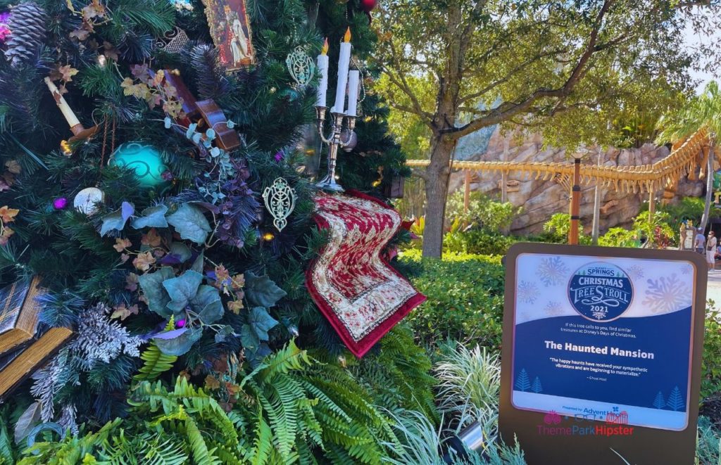 The Haunted Mansion Christmas Tree Disney Springs Christmas Tree Trail and Stroll. Keep reading to learn more about your Disney Christmas trip and the Disney Christmas decorations.