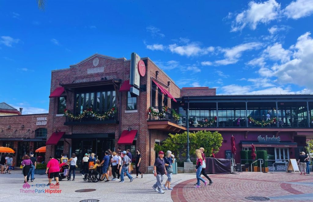 Wine Bar George and The Basket Disney Springs Christmas Decor. Keep reading to learn about the best things to do at Disney World for Christmas.