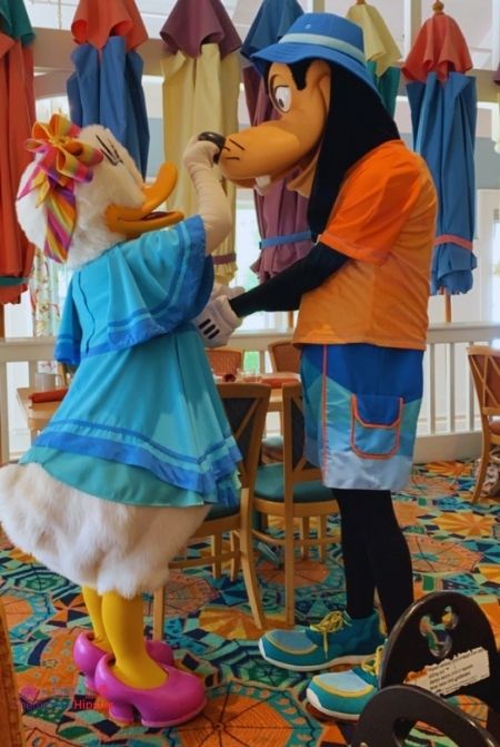 Daisy Duck and Goofy at Disney World Character Dining Breakfast Cape May. Keep reading to know how to choose the best Disney Deluxe Resorts for your vacation.