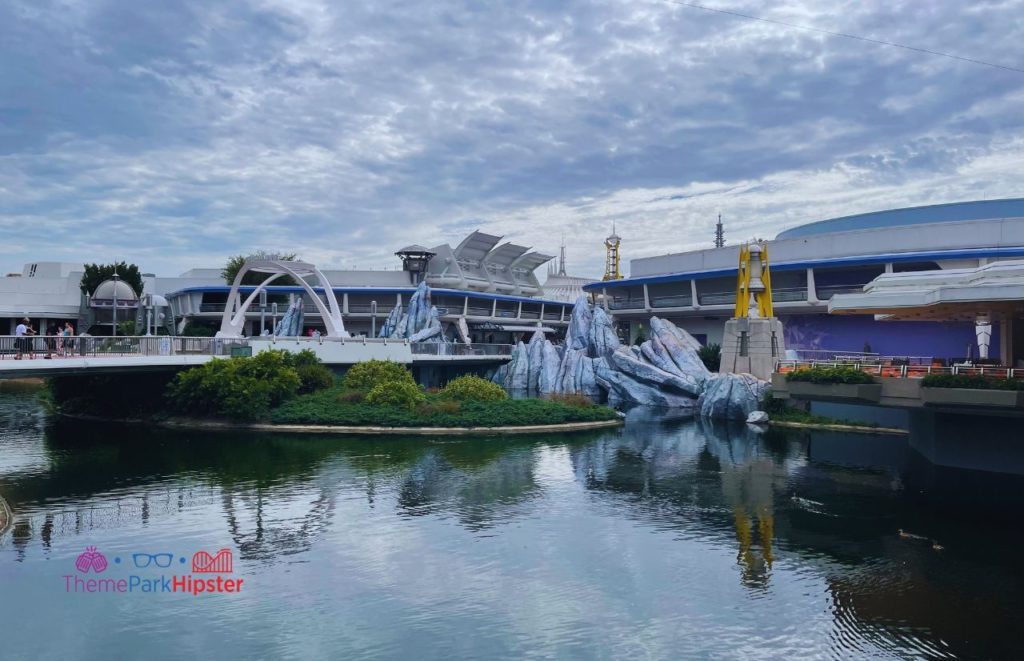 Tomorrowland Lagoon overlook at the Magic Kingdom. Keep reading to learn about Magic Kingdom for adults the Disney grown up way.