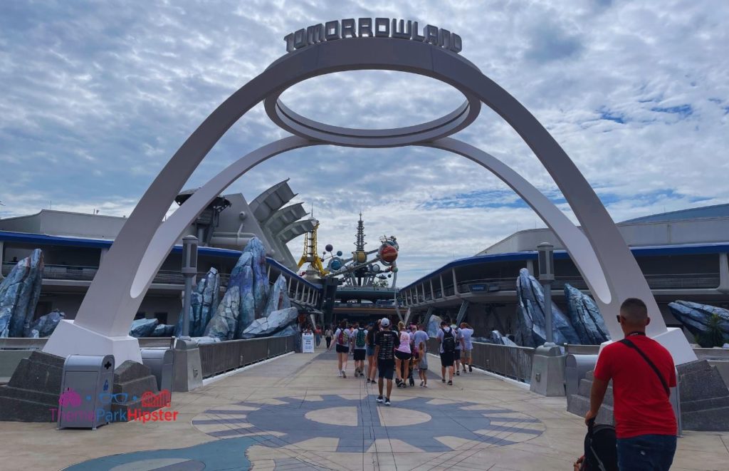 Tomorrowland Sign Magic Kingdom Entrance. Keep reading to get everything you must do at Magic Kingdom and the best things to do at Disney World.