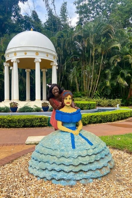 Victoria Wade in the Cypress Gardens Area of Legoland Florida. Keep reading for the full female guide to solo travel.