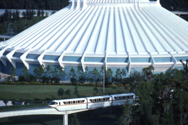 View showing monorail passing by the Space Mountain roller coaster at the Magic Kingdom amusement park in Orlando Florida 1975