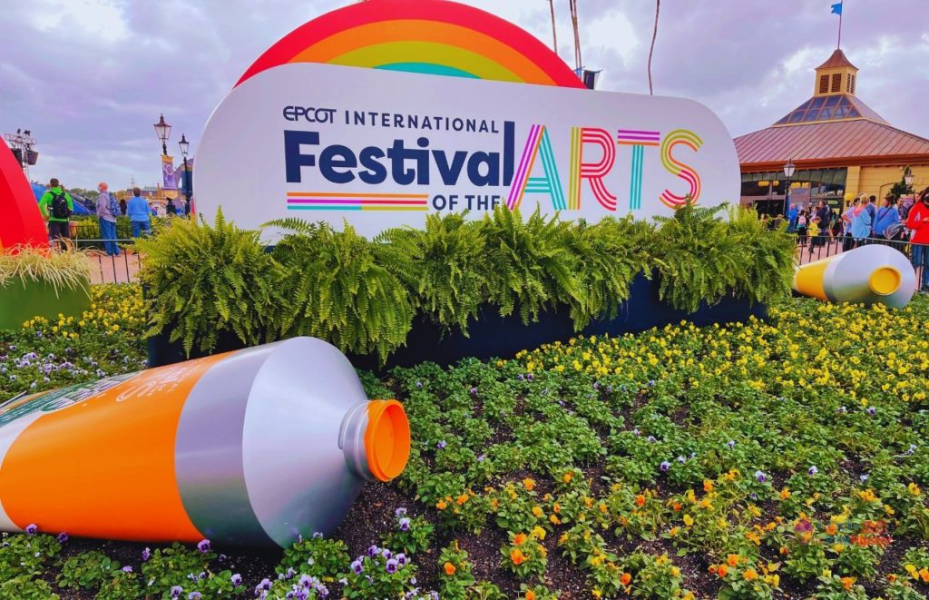 Epcot International Festival of the Arts 2025 Large Orange and Yellow Paint over Grass. Keep reading to learn about the Epcot Festival of the Arts seminars!