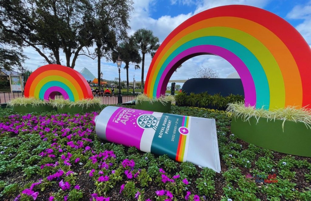 Epcot International Festival of the Arts 2023 Large Royal Purple Pigment Paint on Grass. Keep reading for the best food at Epcot Festival of the Arts.