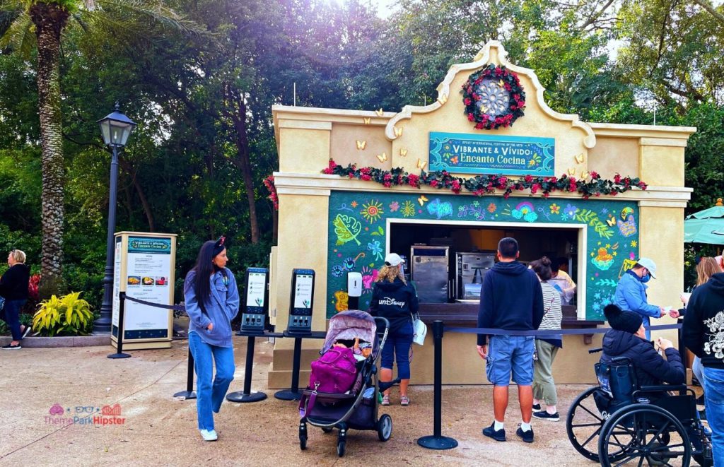 Epcot International Festival of the Arts 2024 Vibrante and Vivido Encanto Cocina Food booth.