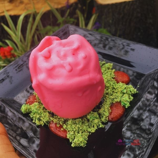 Rose dessert over pistachio dirt at Epcot Festival of the Arts. Keep reading to get the full Epcot Festival of the Arts Menu!