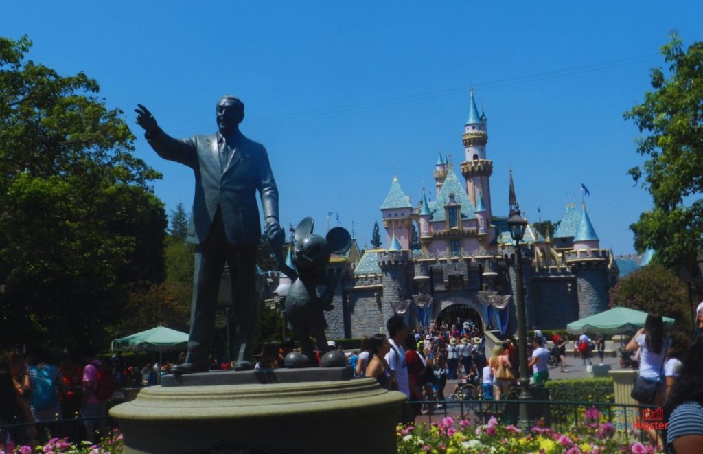 Disneyland Castle with Partners Statue of Mickey Mouse and Walt Disney. Keep reading for the hidden best kept secrets of Disneyland!